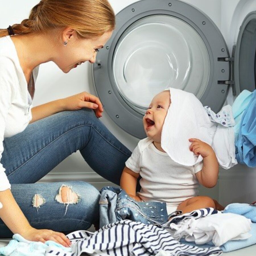 Family doing laundry at home